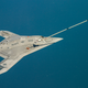 Illustration for article titled Bask In The Awesome Of The Bat-Winged X-47B Sipping Gas From A Tanker